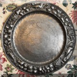 D05. Embossed Italian pewter platter.